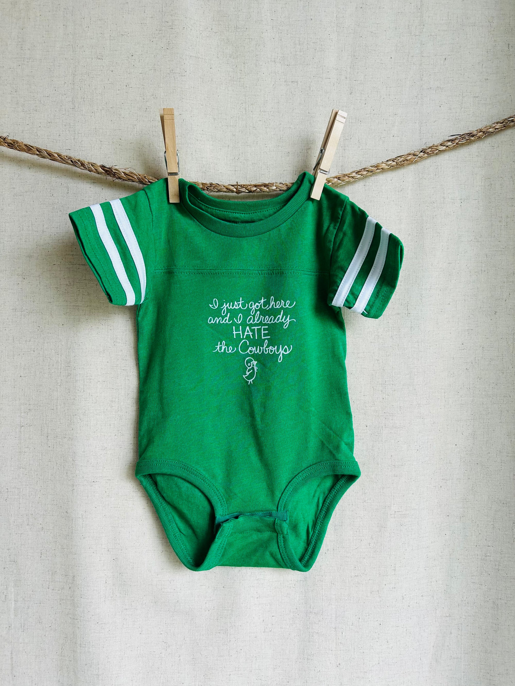 I just got here and I already hate the Cowboys Onesie